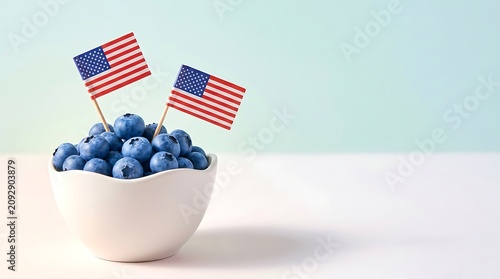 Blueberries in White Bowl with American Flags Top View Minimalist Celebration