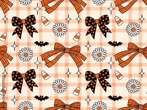 Seamless halloween pattern with orange bows and cute daisy flowers