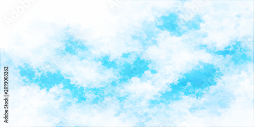 Fotografie A vibrant sky filled with fluffy white clouds against a brilliant blue backdrop, creating a serene and uplifting atmosphere