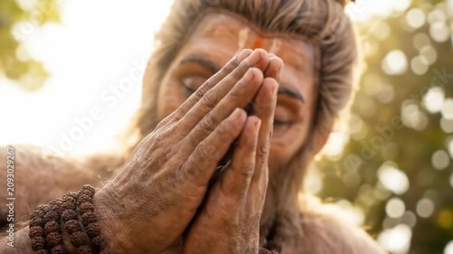 Close-up of Lord Hanuman in Prayer Pose, Displaying Devotion and Spiritual Serenity with Rudraksha Bracelet