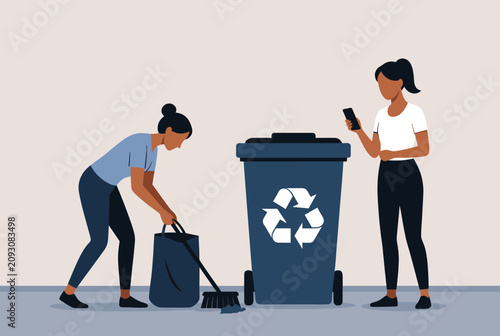 One woman sweeps and cleans trash while her colleague ignores her by looking at her smartphone near a recycling bin.