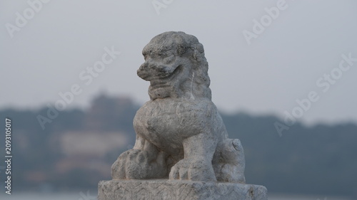 Obraz na płótnie The old stone carved sculptures on the bridge for the bless reason