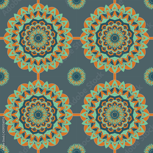 Modern seamless mandala featuring layered teal and orange floral geometry on a gray background. Perfect for fabric, wallpaper, packaging, apparel, home décor, and digital prints.