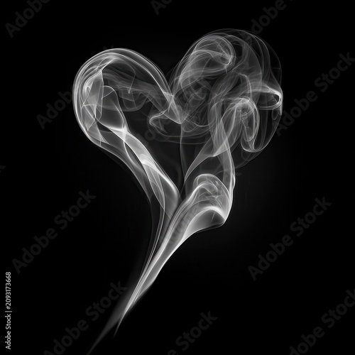 White smoke curls and twists to form a delicate heart shape against a black background