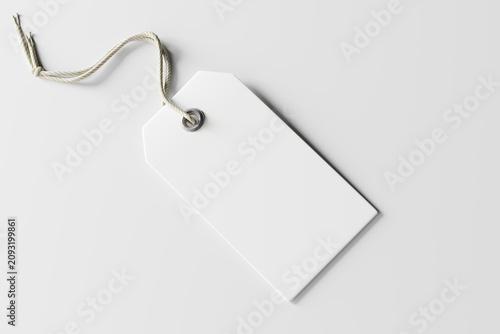 White hang tag mockup with twine string, blank cardboard price tag or gift tag template isolated on light gray background, minimalist diagonal clothing label for fashion branding, 3d render