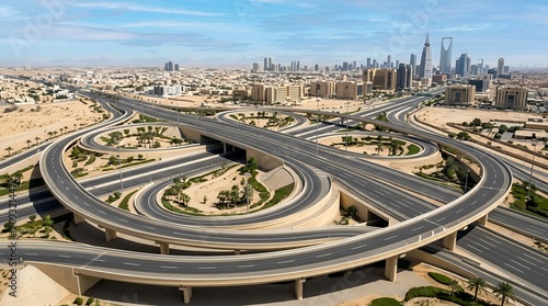 Modern highway interchange curving in Riyadh Saudi Arabia during the day
