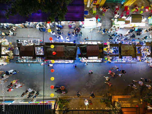 Panorama aerial drone view of Hoi An ancient town with boat tour and beautiful lanterns in night. UNESCO world heritage. One of the most travel popular touristic destinations 

