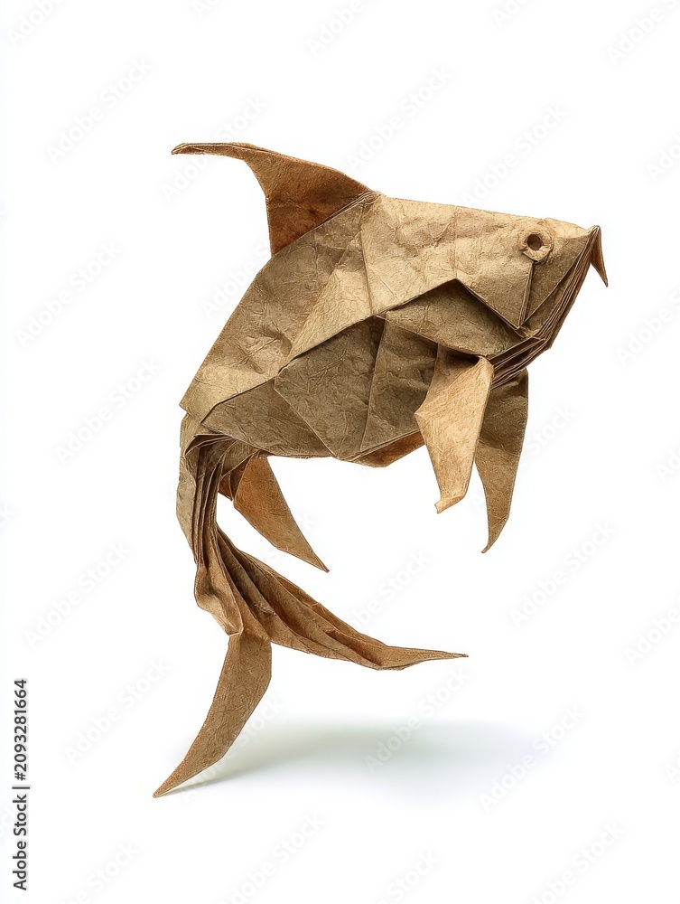 Fototapeta premium Golden Origami Fish Crafted From Textured Paper Isolated On A White Background Studio Shot