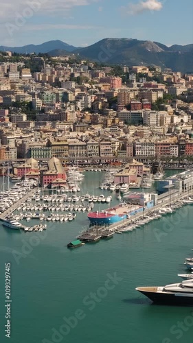 Vertical High Angle Shot Capturing the Old Port Marina and Dense Urban Topography of Genoa