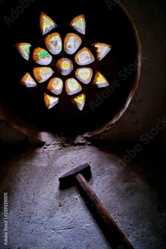Fotografie Waldensian Mandala Wall Opening with hammer