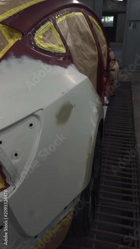 Car body repair and preparation for painting in a professional workshop