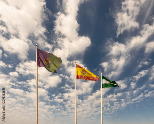 City flag of Malaga, national flag of Spain and the flag of Andalusia