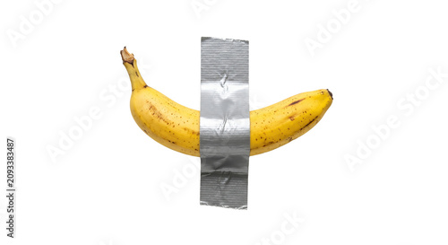 A single fresh yellow banana taped to a flat surface with grey duct tape high quality PNG on white background