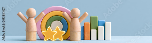 Wooden figures represent team with colorful target, stars, and bar chart symbolizing project management, roles, and strategy for business success and teamwork motivation
