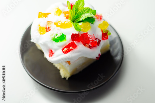 White plate holds a layered dessert