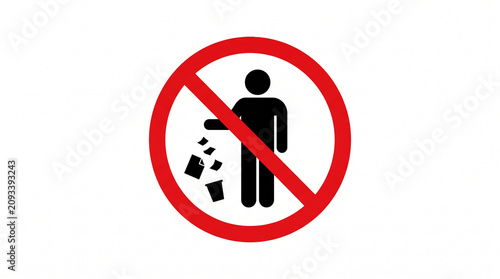A person throwing trash is prohibited in the city environment with a sign.