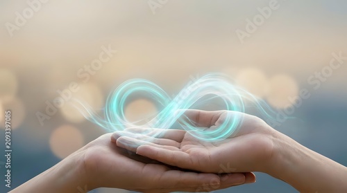 Hands holding glowing infinity symbol representing endless possibilities, sustainability, and continuous growth for business and technology concepts.