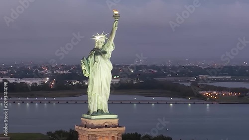 Aerial View of Statue of Liberty, on Liberty Island in New York Harbor at Sunset