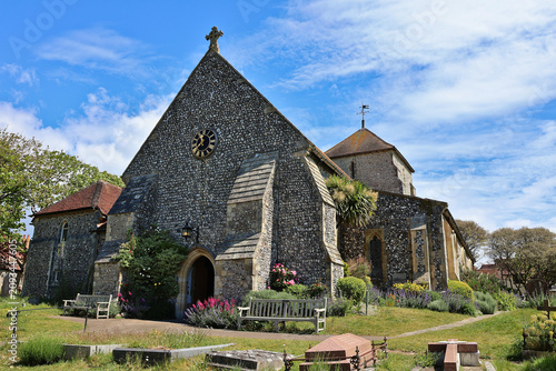 Fotografie Historic St Margaret's Church, Rottingdean on blue sky spring day; traditional S