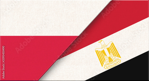Photos Double flag of Poland and Egypt on fabric texture