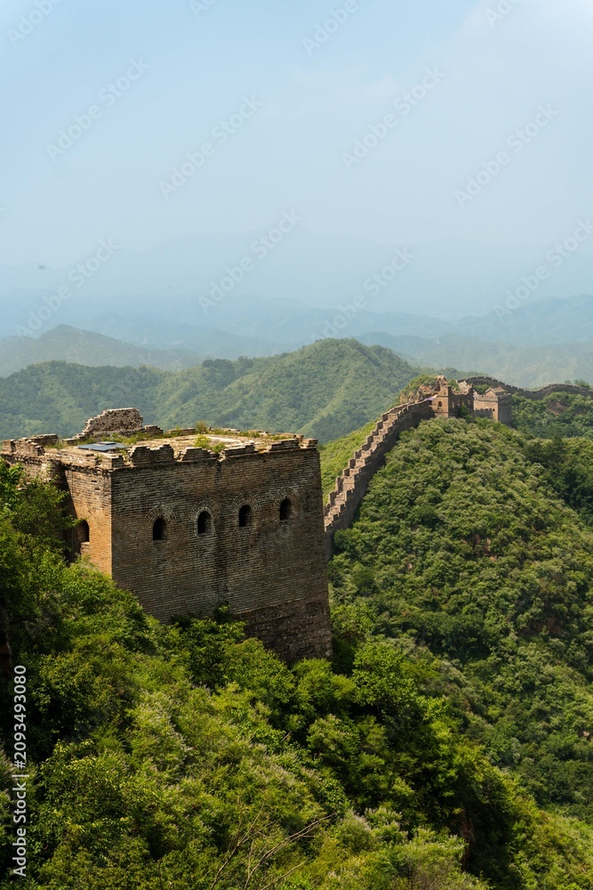 Fototapeta premium Jinshalang unrestored section of the Great Wall of China at sunrise