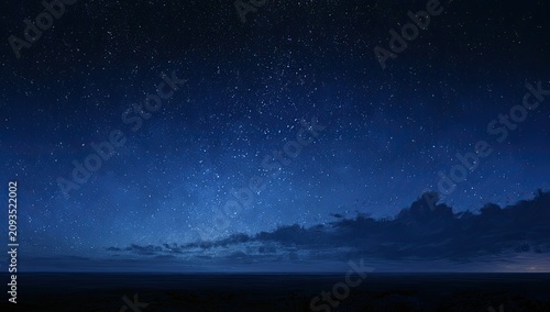 Vast, starry night sky over dark, flat terrain with faint clouds