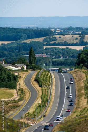 The Rolling Hills and dramatic road compression of Colliery Way (Gedling Access Road) seen from Gedling Country Park
