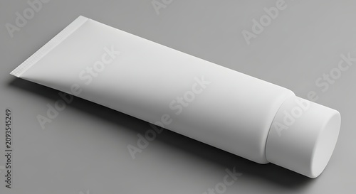 Blank White Cosmetic Tube Lying on Gray Studio Background