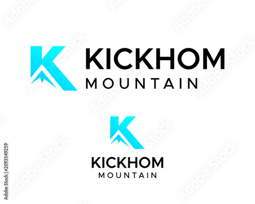 A monogram logo featuring the letter K and a mountain.