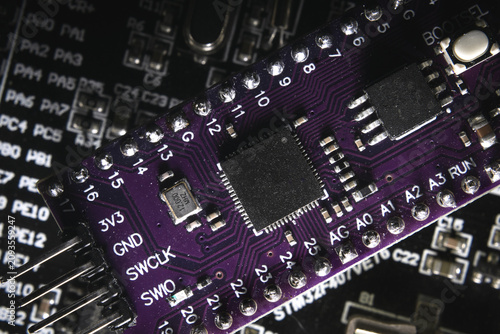 Obraz na plátně A close-up of a microcontroller; a series of photos on the topic of hardware and embedded systems