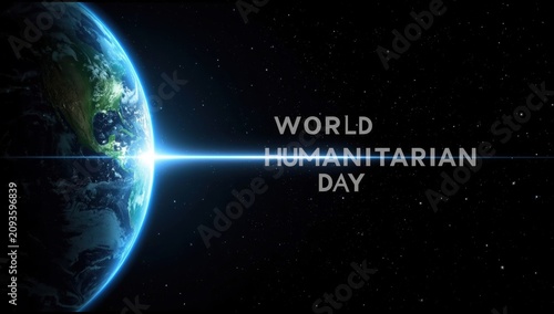 Earth planet view from space with bright light beam and humanitarian day text on dark starry background