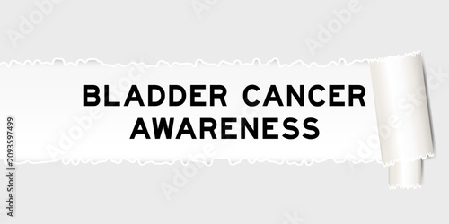 Foto Ripped gray paper background that have word bladder cancer awareness under torn