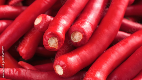Fotografie Fresh bird's eye chilies in a basket