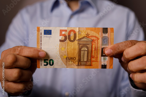 Close-up of a person holdin...