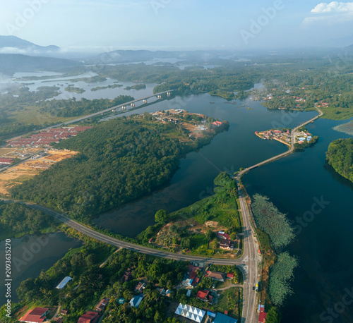 Cuadro en lienzo Aerial drone view of rural settlements by a lakeside scenery at Tasik Raban or R