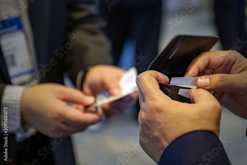 Businessmen Exchanging Business Cards