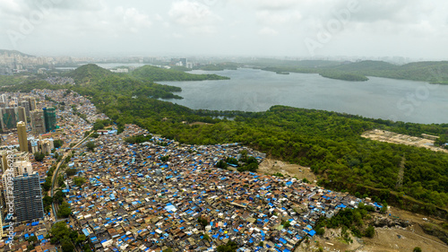 Dense residential settlement near mangroves in Mumbai India drone view