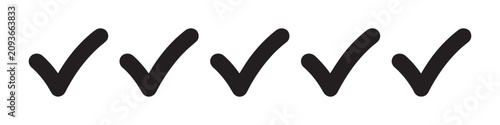 Fotografie Black thick checkmark icons set with rounded edges showing completion and success symbols on board