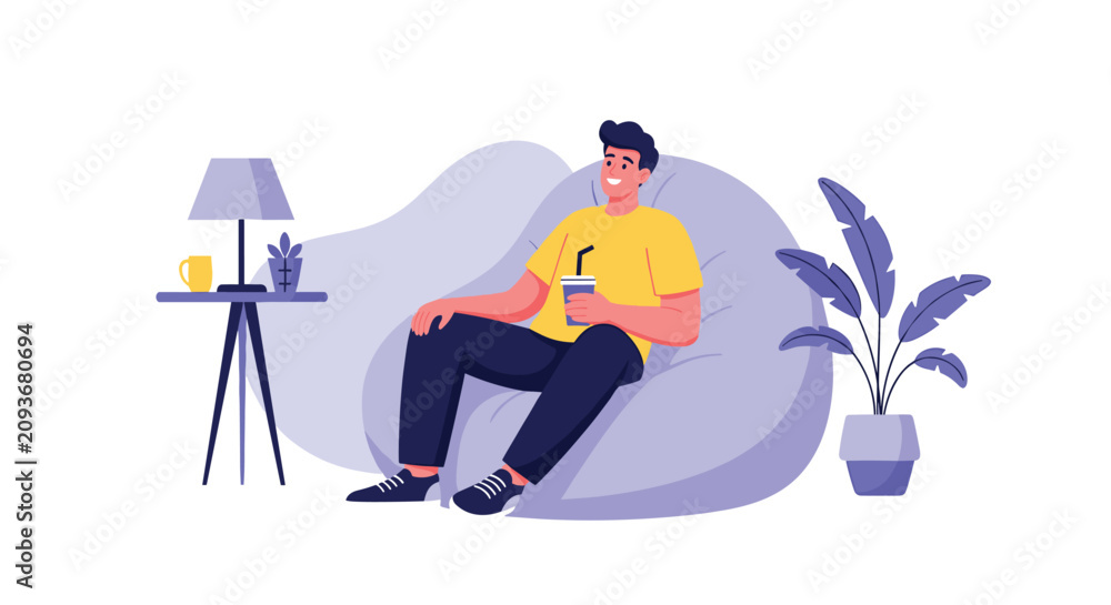 Obraz premium Smiling young man relaxing on a comfortable purple beanbag chair and holding cup with straw in cozy room.