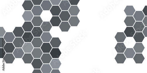 Abstract abstract hexagonal pattern composed of interlocking geometric shapes in varying shades of grey, creating a modern and minimalist design.