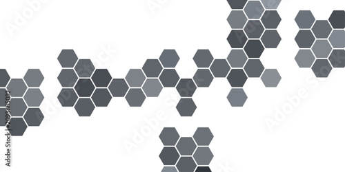 Abstract abstract mosaic of hexagonal shapes in varying shades of grey creates a modern and minimalist geometric pattern, evoking a sense of digital connectivity and structured design.