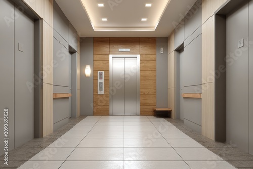 Contemporary building lobby features multiple polished metal lift doors set into contrasting wood and muted wall panels