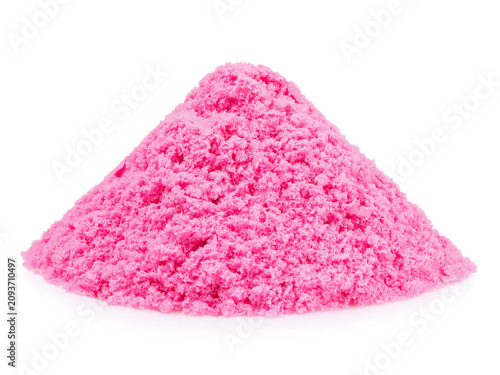 A pile of pink kinetic sand with a grainy texture, isolated on a white background