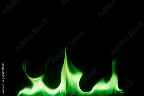 Vibrant Green Flames Isolated on a Black Background for Visual Impact
