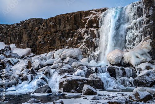 Frozen Waterfall in Thingvellir National Park, Iceland in Winter