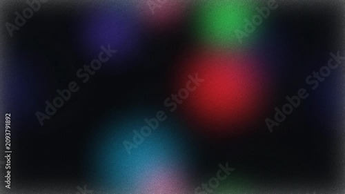 Abstract motion background, with soft glowing, colorful bokeh lights, and grain texture
