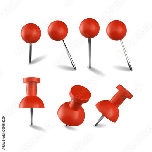 Bild auf Leinwand Set of red plastic push pins and round head thumbtacks with metal needles, arranged in various angles and