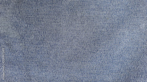 Fotografija Blue denim fabric with a detailed woven texture and classic material pattern