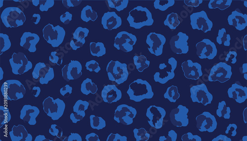 Фотография Abstract seamless pattern featuring irregular stylized two-tone blue leopard spots and rosettes against a solid dark navy background