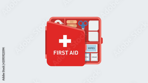 First aid kit box containing essential medical supplies and bandages sits open for emergency use.